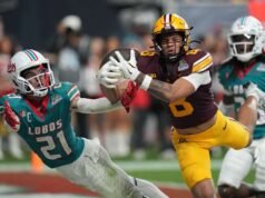 Tangkapan TD menyelam Smith dalam perpanjangan waktu memberi Minnesota kemenangan 20-17 atas New Mexico di Rate Bowl