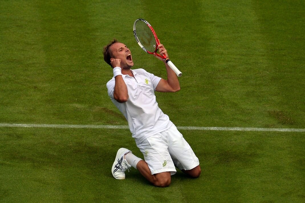 Steve Darcis merayakannya