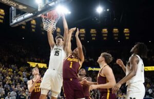Bola basket Michigan peringkat ketiga mengamankan bagiannya dalam kejuaraan Sepuluh Besar dengan kemenangan atas Minnesota