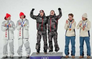 Austria memenangkan emas dalam lompat ski tim super putra Olimpiade pertama karena acara harus dipersingkat karena cuaca
