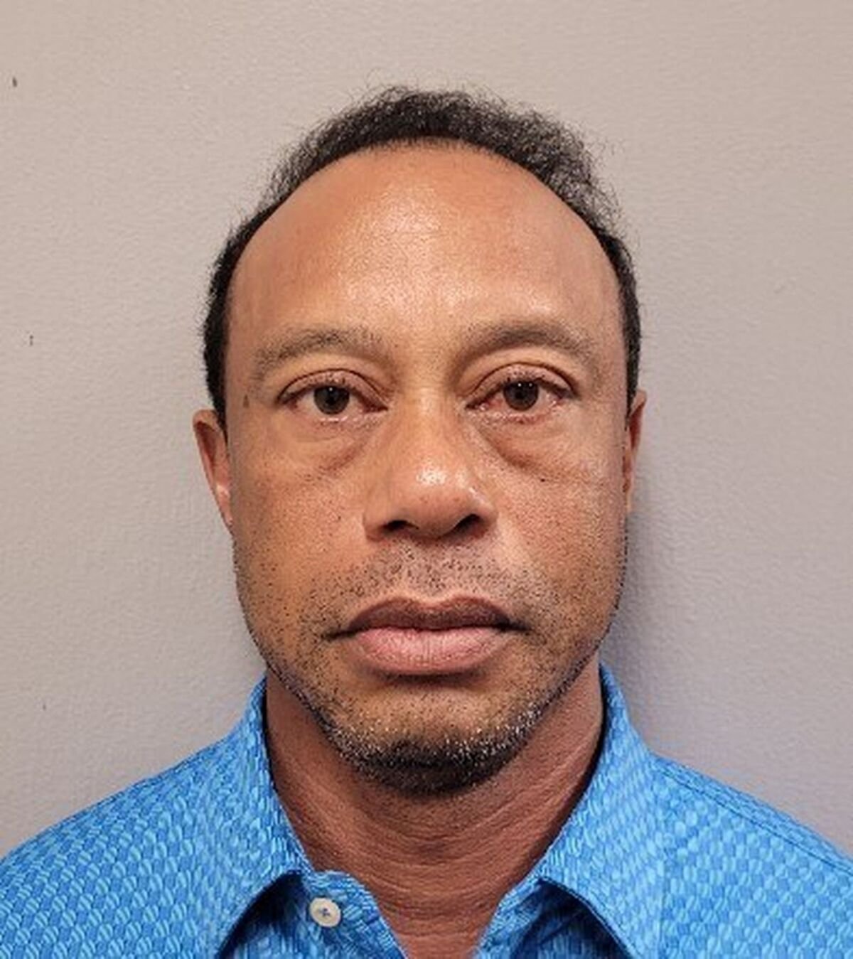 Foto selebaran yang disediakan oleh Kantor Sheriff Martin County menunjukkan Tiger Woods (Kantor Sheriff Martin County melalui AP)