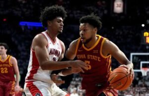 Bradley mencetak 17 poin saat No. 2 Arizona mengamankan gelar 12 Besar dengan kemenangan 73-57 atas No. 6 Iowa St