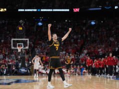 Iowa yang menjadi unggulan kesembilan melanjutkan pencapaiannya yang luar biasa di bulan Maret, mengalahkan Nebraska 77-71 untuk melaju ke Elite Eight