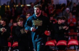 Trumble menerima NWCA Scholar All-American Distinction