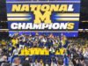 Universitas Michigan merayakan kejuaraan bola basket nasional dengan parade di Crisler Center