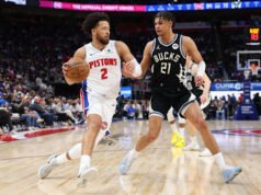 Juara Nasional Bola Basket Michigan, anggota Fab 5, menghadiri pertandingan Pistons dengan imbalan Cade Cunningham