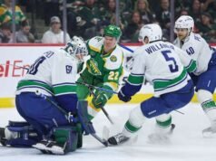 Wild mengamankan tempat di babak playoff dengan kemenangan 5-2 atas Canucks
