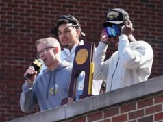 Kembali ke Ann Arbor, Dusty May memberi tahu para penggemar Michigan yang bersorak, “Trofi ini milik Anda.”