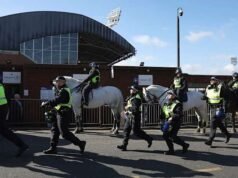 Millwall marah setelah brosur anti-rasisme menunjukkan lencana jubah Ku Klux Klan